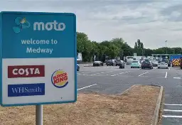 Electric vehicle charger points lay idle at motorway services