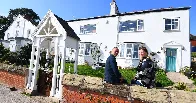 Couple 'hear voices' in new house with bricked up cellar