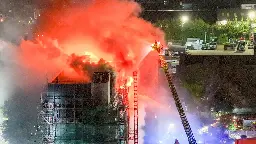 More than 200 firefighters respond to blaze at east London tower block