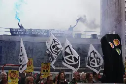 Activists scale East Sussex County Hall roof to demand council cuts ties with Big Oil - Extinction Rebellion UK