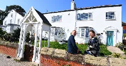 Couple 'hear voices' in new house with bricked up cellar