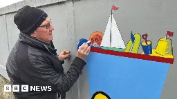 The man tackling graffiti by creating murals