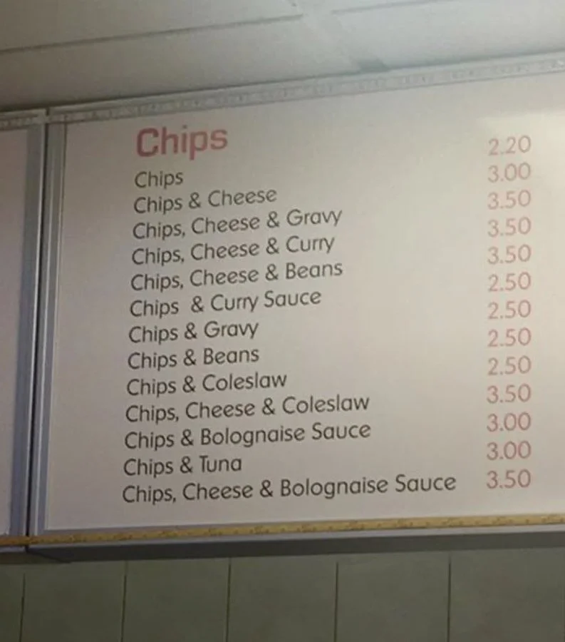 A menu showing chips servered with various things, such as beans, cheese and bolognaise sauce.